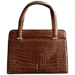 Gucci cognac alligator handbag & tote
With matching wallet in same alligator